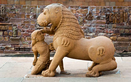 Sculpture of  lion and woman in group the famous temples of Khajuraho. This is a large group of medieval hindu and jain temples, famous for their erotic sculptures. Situated in Khajuraho, Madhya Pradesh, India.のeditorial素材