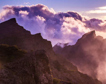 Amazing view of mountain peaks with beautiful clouds on the sunset. Location: Tenerife, Canary Islands, Spain. Artistic picture. Beauty world.の写真素材