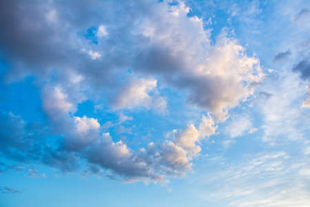 Beautiful blue sky with clouds in the shape of heart. Abstract background