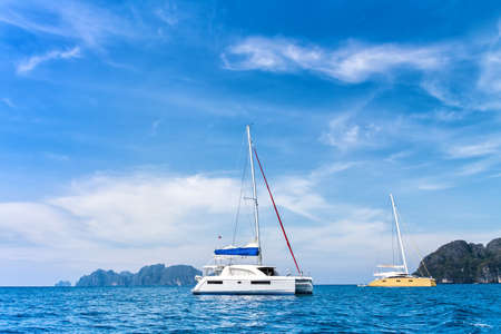 Catamaran boats in beautiful bay near Koh Phi Phi Don in Andaman sea. Location: island Koh Phi Phi Don, Krabi, South Thailand.の写真素材