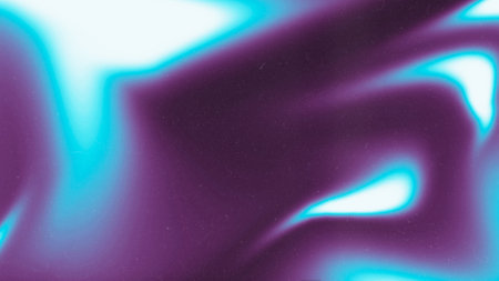 Blurred blue and purple acid gradient tones. Abstract wallpaper on dark grainy background. Glowing light. Large banner.の写真素材