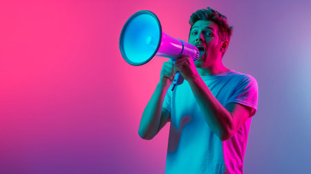 Young caucasian mans portrait on gradient studio background with neon light. Beautiful male model in shirt. Concept of human emotions, facial expression, sales, ad. Copyspace. Facial expression.の素材