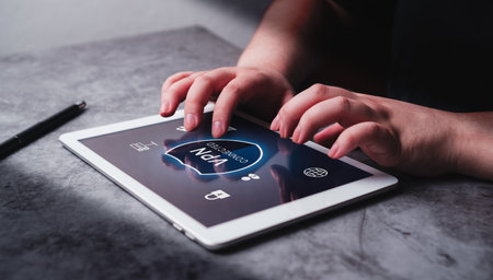 Woman use VPN Virtual Private Network protocol on digital tablet. VPN concept.の写真素材
