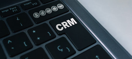 CRM Customer Relationship Management for business sales marketing system concept. CRM database analysis with icons of keyboard laptop.の写真素材
