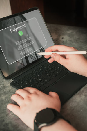 Woman using digital tablet with online payment on screen. Bank payment approved concept.