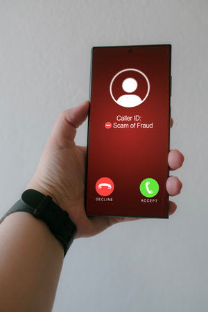 Woman receives unwanted call from suspected number scam. Unwanted anonymous call. Fraud and phishing...