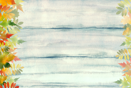 Autumn background watercolor. Floral design with autumn leaves watercolor in hand painting style on wood texture backgroundの写真素材