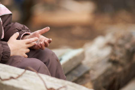 Dirty girl hand. Gardening in autumn.の写真素材