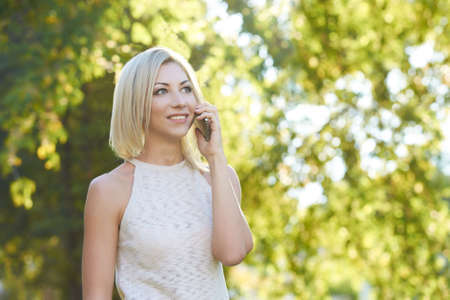 Girl with a phone. Portrait.の写真素材