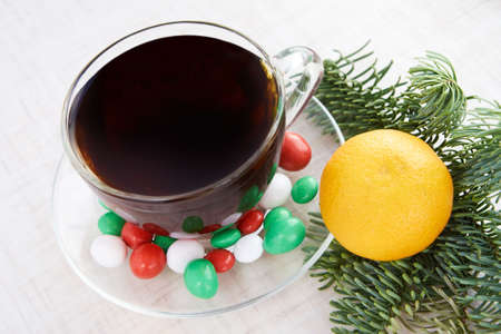 New Year. Christmas tree. Mandarin. Hot tea. White background.の写真素材