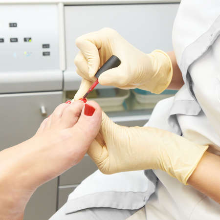 Pedicure. Lacquer. Personal hygiene. Leg. Personal care.の写真素材
