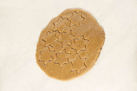 Gingerbread Cookie. Ready dough. Shape star.の写真素材