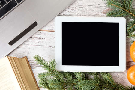 Computer work. Laptop and tablet. Business. New Year's atmosphere.の写真素材
