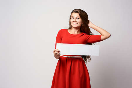 Girl with sign. Template. Pride of parents.の写真素材