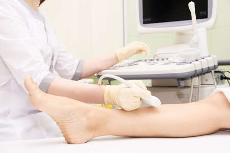 Apparatus ultrasound examination. Patients foot. Medical research. Doctors work.の写真素材