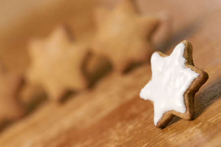 Gingerbread Cookie. White sweet glaze. Blurred Background.の写真素材