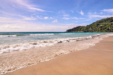 White wave. Splash. Blue sky.の写真素材