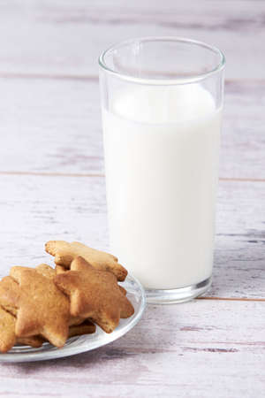 Gingerbread Cookie. Glass milk. Delicious snack.の写真素材