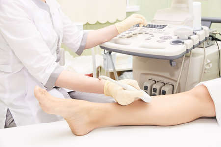 Apparatus ultrasound examination. Doctors work. Patients foot. Medical research.の写真素材