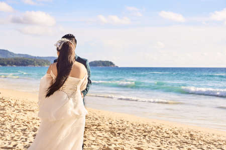 Bride and groom. Relax on beach. Wedding.の写真素材