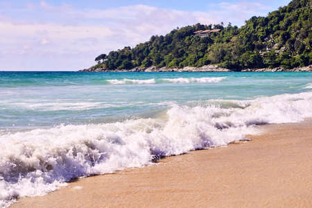 Blue sky. Strong sea waves.の写真素材