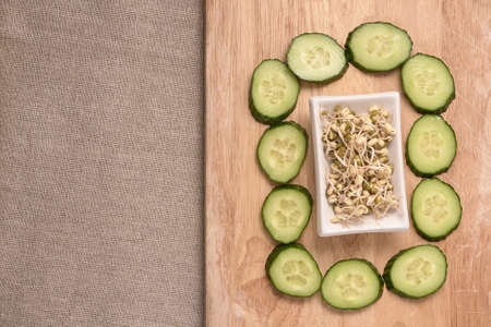 Fresh cucumber. Sprouted beans. Healthy food.の写真素材