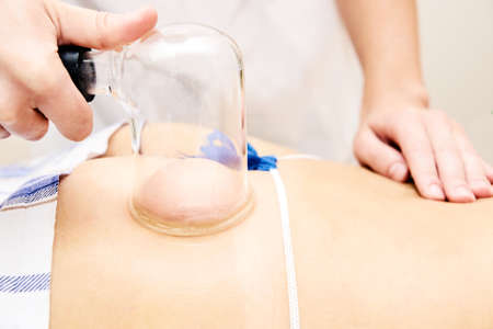 Slimming procedure. Doctor and patient. Hospital.の写真素材