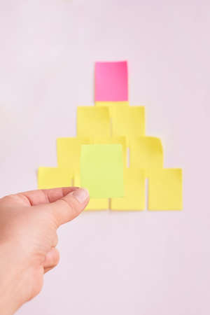 White background. Yellow stickers. Unusual tree. Bright colors.の写真素材
