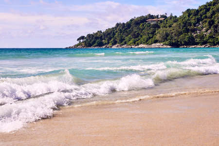 Strong sea waves. Blue sky.の写真素材