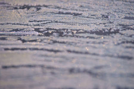 Winter pattern. White snowflakes. Grey colour. Boke.の写真素材