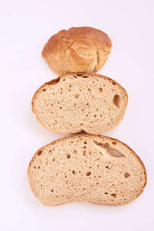 Three slices bread. Unusual tree. Light background.の写真素材