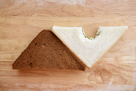 Different bread. Black and white. Sandwich with ham.の写真素材