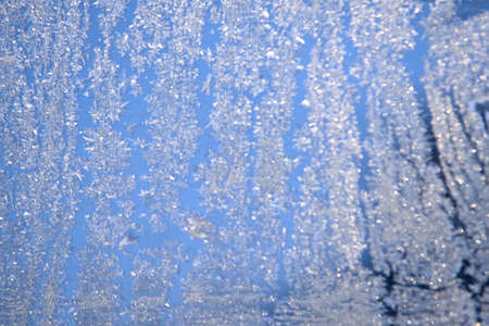 Beautiful pattern on glass. White shiny color.