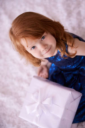 Large gift box. Little sweet girl.の写真素材