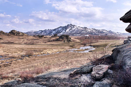 Beautiful landscape. Mountain landscape. Gray stones. Dry grass.
