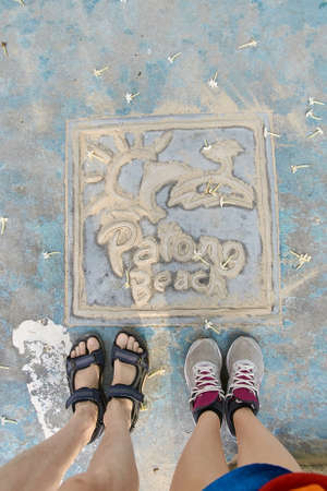 Drawing with sand. From above. Legs.