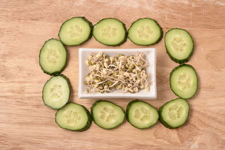 Fresh cucumber. Sprouted beans. Healthy food.の写真素材