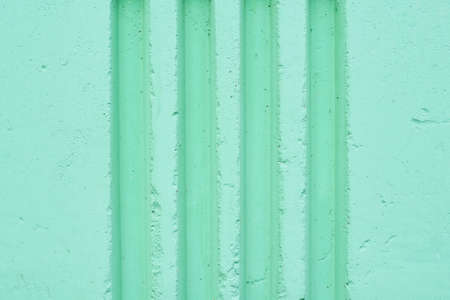Beautiful emerald color. Vertical grooves on the wall.の写真素材