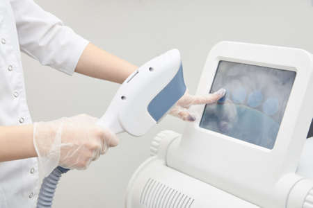 Elos Laser Legs Hair Removal. Epilation Treatment In Cosmetic Beauty Clinic.の写真素材