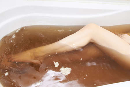 Modern spa treatments. Female feet. Bathing baths.