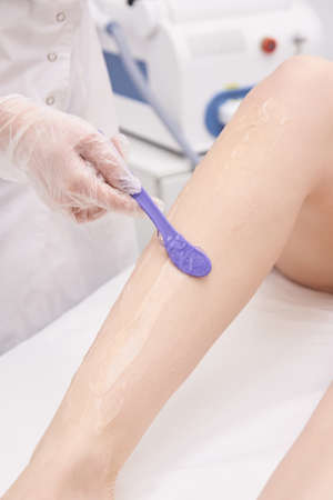 Gel for ultrasound. Female foot. Modern equipment. Light background.の写真素材