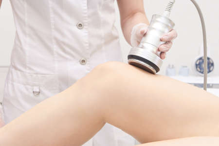 Cosmetic procedures. Modern equipment. Ultrasonic cavitation.の写真素材