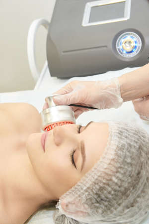 Facial spa cosmetology procedure. Skin care lift anti age.の写真素材