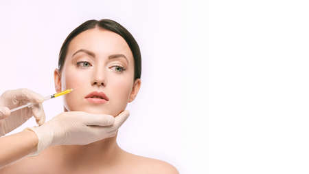 woman face injection. salon cosmetology procedure. skin medical care.  dermatology treatment. anti...