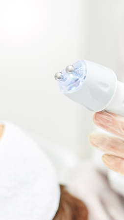Facial skincare medical spa therapy. Beauty woman face cleaning. Specialist aesthetics ultra sound...