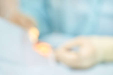 Ophthalmology laser microscope operation. Clinic room with doctor and parient. Blur background....