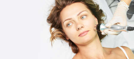 Dermatology skin care facial therapy. Medical spa anto wrinkles procedure. Woman face rejuvenation....