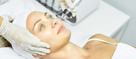 Dermatology skin care facial therapy. Medical spa anto wrinkles procedure. Woman face rejuvenation....