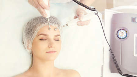 Dermatology skin care facial therapy. Medical spa anto wrinkles procedure. Woman face rejuvenation....