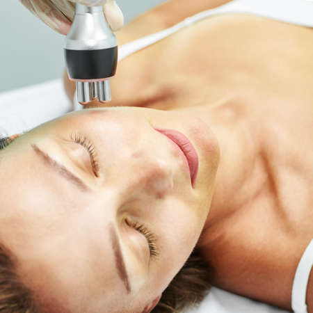 Dermatology skin care facial therapy. Medical spa anto wrinkles procedure. Woman face rejuvenation....
